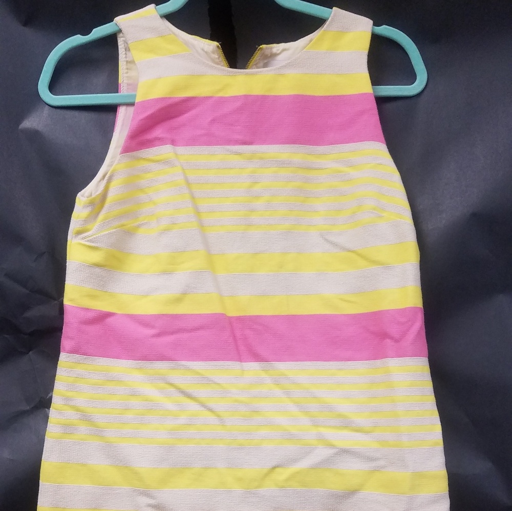 Sleeveless shift dress.